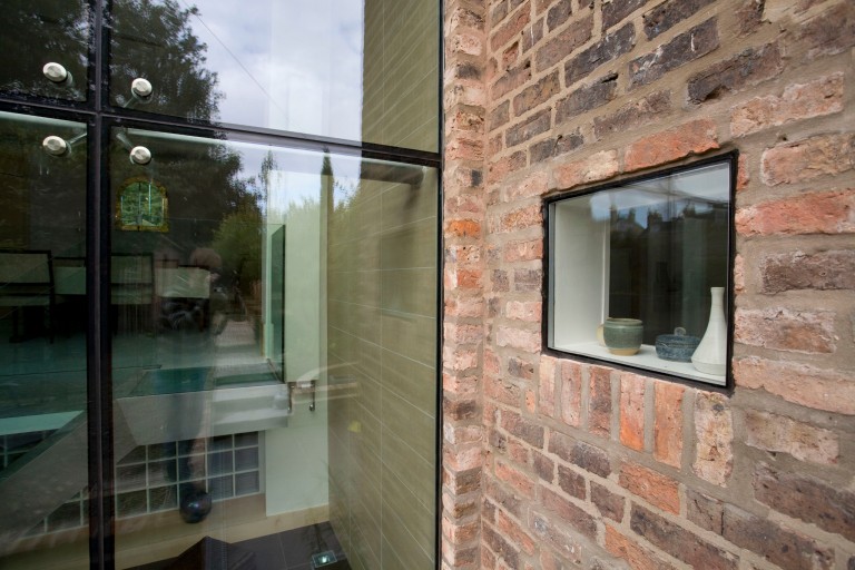 Detail of structural glass and fixed light in listed building, family home in York