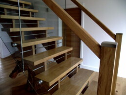 Bespoke Oak, glass and aluminium staircase